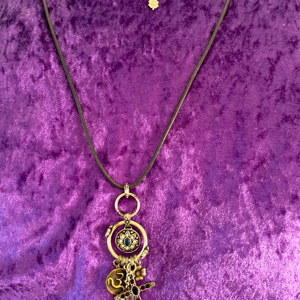 Necklace with leather string, silver focal piece